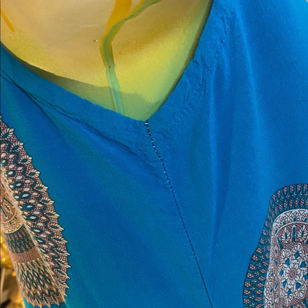 Blue Sleeveless Super Soft Fabric Top with Geometrical Patterned Designs - Picture 9 of 10